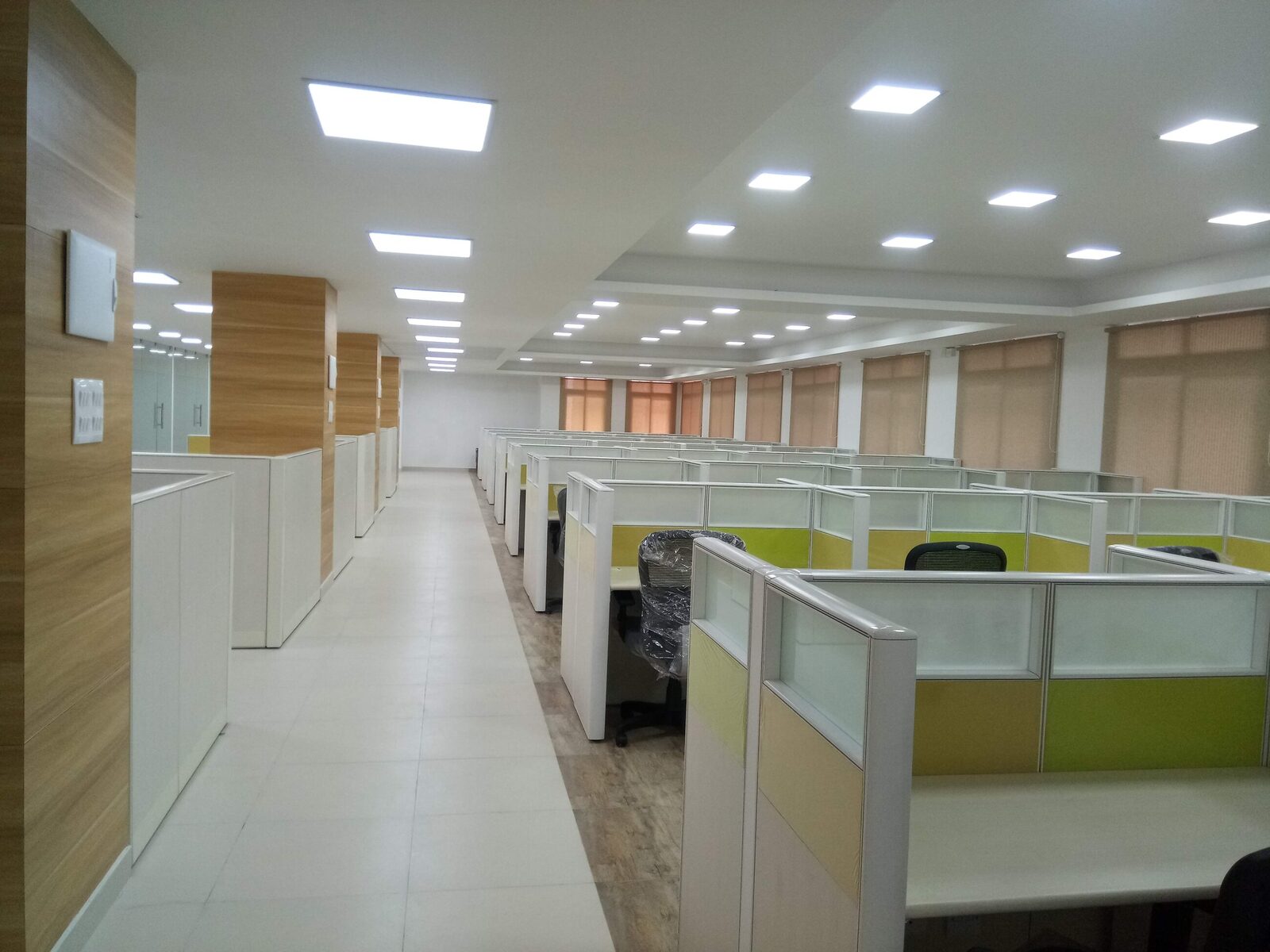 Office floor with desk clusters and cabins
